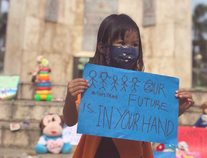 A young Indonesian rebel takes part in a Toy Strike on World Children’s Day